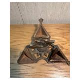Ornate metal topper