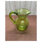 Hand blown glass pitcher