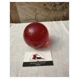 Red glass paper weight