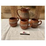 Stoneware pitcher and mugs
