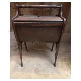 Antique sewing box on stand