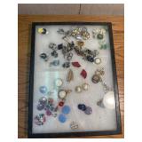 Earrings in display case