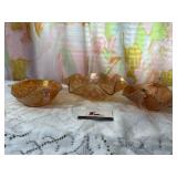 Three Marigold Carnival Glass dishes