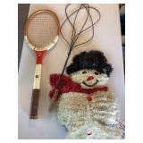 Rug beater, racket & snowman decor