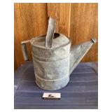 Metal watering can