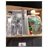 Silverware, cookie cutters, measuring cups