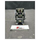 Salesman sample cast iron grinder