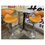 Pub style table with orange chairs