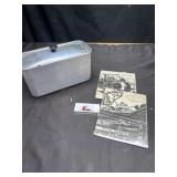 Linoleum prints and vintage metal canister