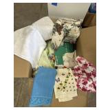 box of doilies and miscellaneous items.