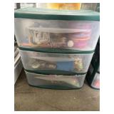 Plastic organizer full of craft items