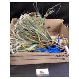 Artificial flowers and rope