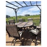 Stoneware top patio table 58 inches wide with