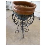 Metal plant stand with stoneware planter