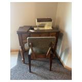 Singer in cabinet sewing machine
