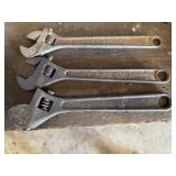 Adjustable wrenches