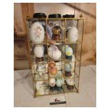 Display case of decorative eggs