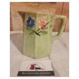 Floral ceramic pitcher
