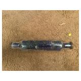 Glass rolling pin full of colored beads