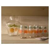 Orange juice pitcher and glasses
