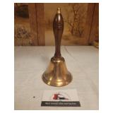 Brass bell with wooden handle