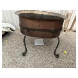 Copper planter in metal stand