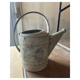 Galvanized watering can