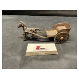 Cast Iron Horse and Carriage .