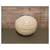 Plastic golf ball coin bank