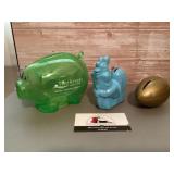 Plastic coin banks advertising to include two