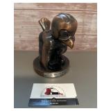 Vintage Herky the Hawk coin bank with a bronze