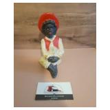 Vintage cast iron sitting girl Americana