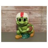 Ceramic football playing frog coin bank