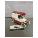 Ertl 1913 Ford Model T bank is a red and white