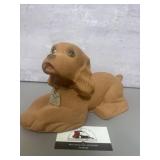 Vintage dog bank featuring advertising from H