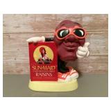 Vintage California Raisin coin bank