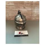 Vintage metal coin bank to look like a medieval
