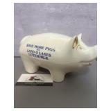 Vintage ceramic advertising piggy bank features