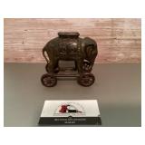 AC Williams elephant on wheels cast-iron Coin bank