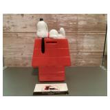 Plastic Snoopy coin bank
