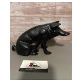 Cast iron pig coin bank