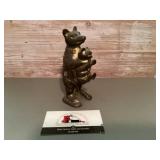 Cast-iron bear holding a baby bear coin bank