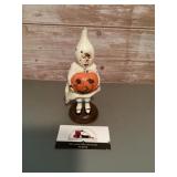 Vintage cast-iron bank child dressed in white
