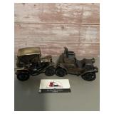2- Vintage metal coin bank, featuring