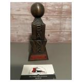 Vintage metal coin bank featuring