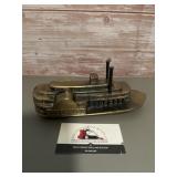 Vintage metal coin bank featuring