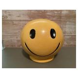 Ceramic happy face coin bank