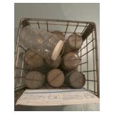 Vintage glass bottles in metal crate
