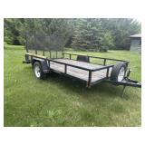 Sure trac trailer with gorilla lift