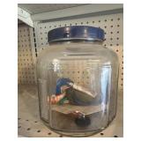 Vintage glass jar with patch supplies